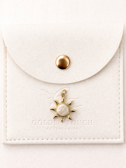 Gold sun charmp pendant with middle cream white detail