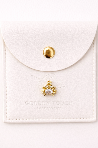 Tiny gold crab with middle zirconia crystal charm pendant