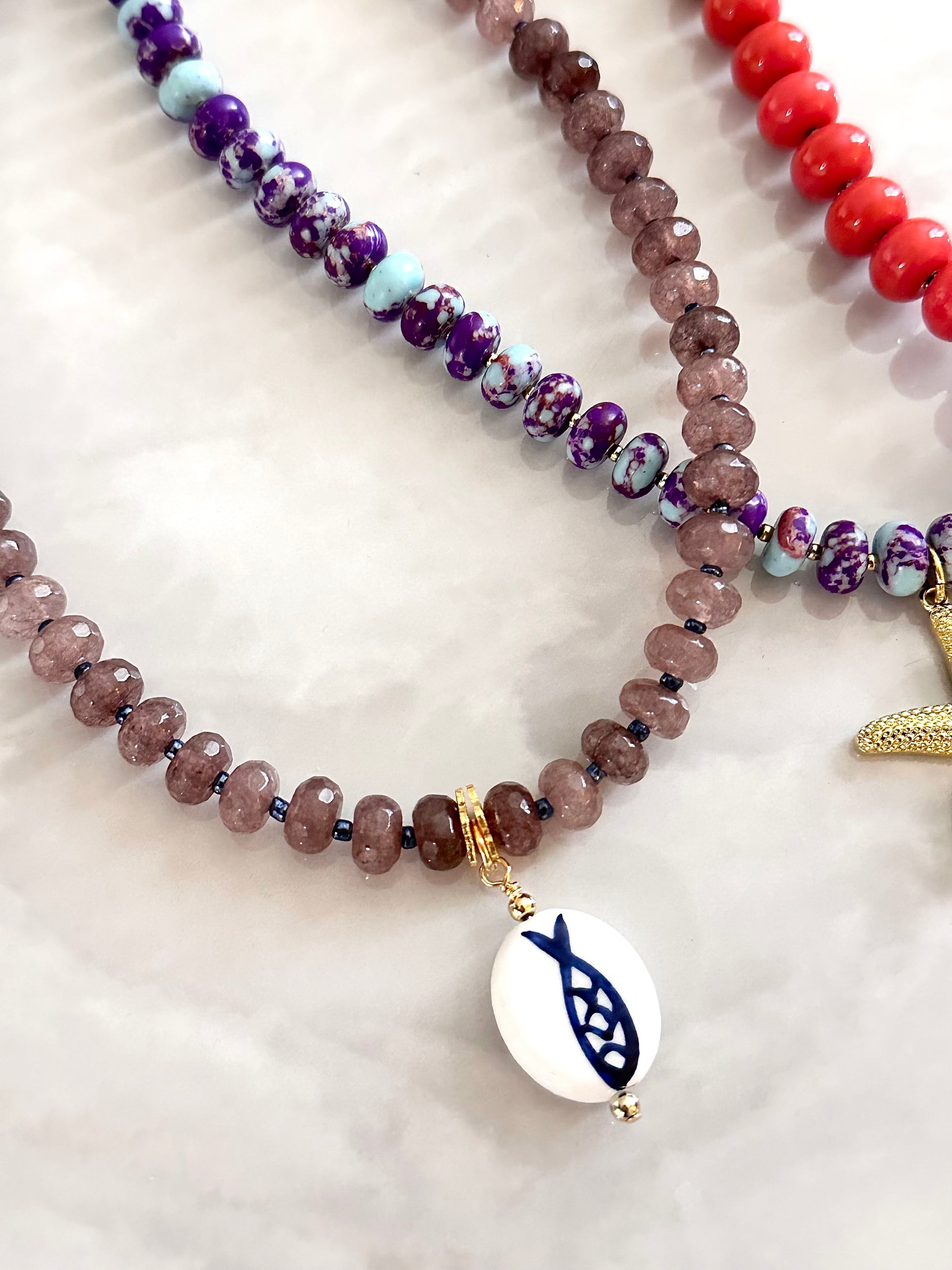 brown gemstones necklace with fish pendant
