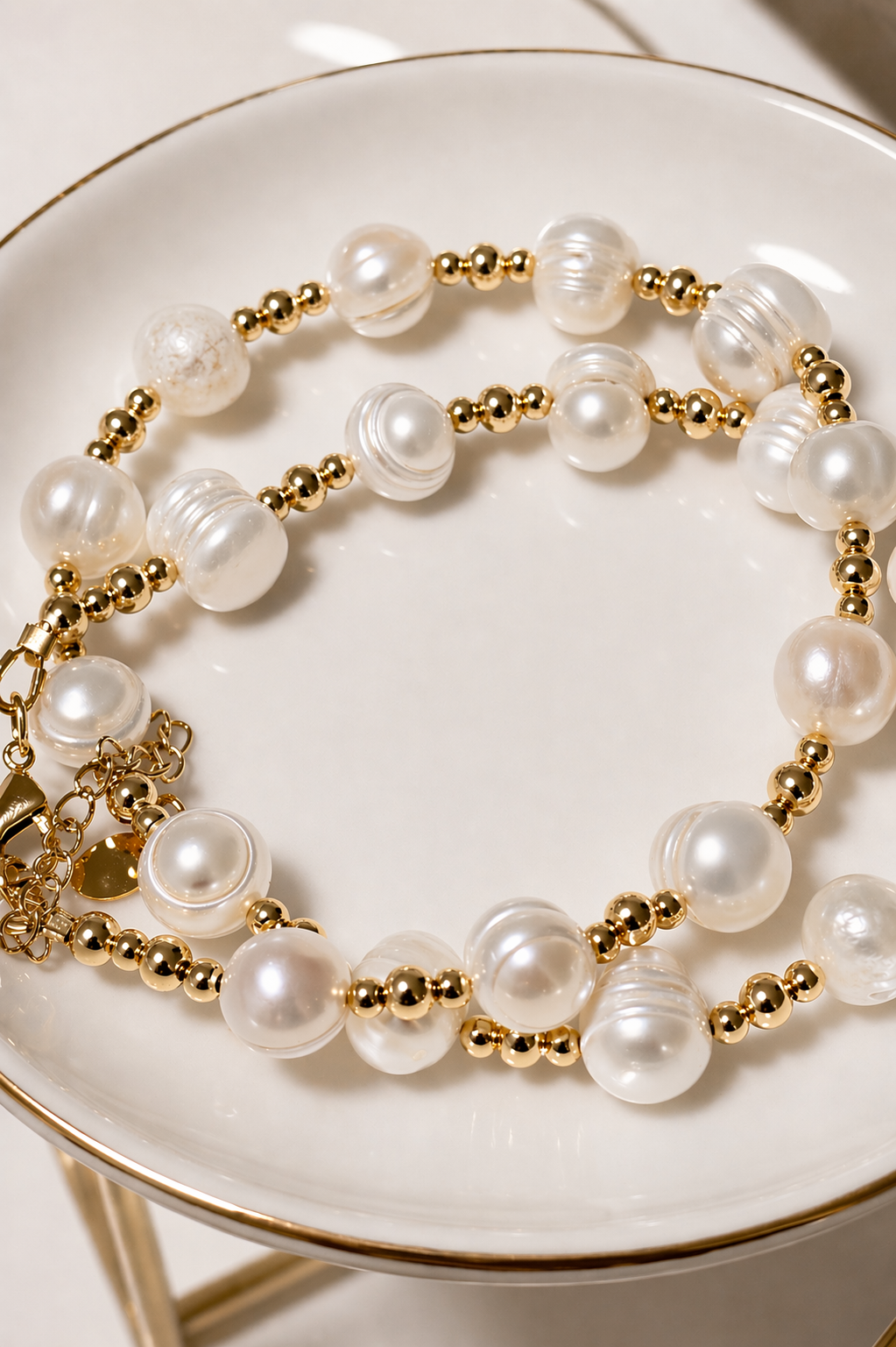     Close up pearl gold necklace detail