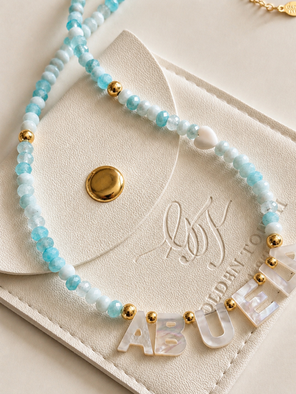 Turquoise agate beads necklace with mother of pearl ABUELA spelling on necklace 