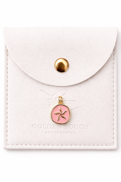 sea star shell round pendant in coral background 