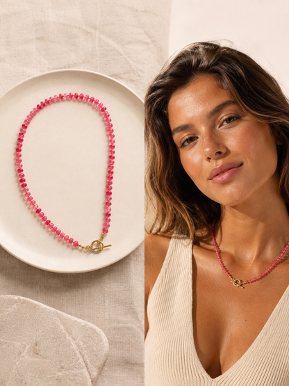A split image showing a strawberry pink agate beaded necklace with a front tbar clasp on a white plate on the left, and a woman wearing the necklace on the right.