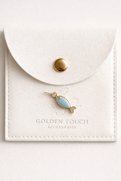 small turquoise fish charm